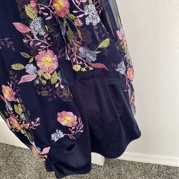 GB formal gown in navy with embroidered pink, yellow, and blue flowers. - Picture 5 of 15